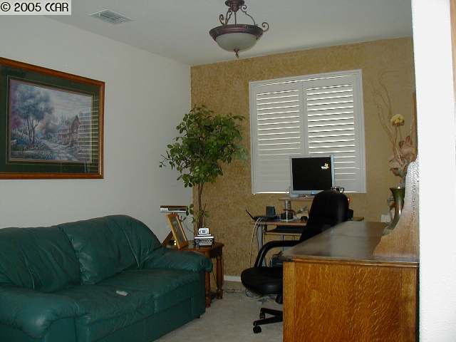 590 Anderson Rio Vista Rio Vista, CA 94571 - Photo 5 of 7 a living room with furniture and a flat screen tv