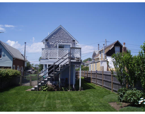 21 Reed Street Marshfield, MA 02020 - Photo 1 of 19 a front view of a house with a yard