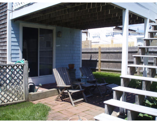 21 Reed Street Marshfield, MA 02020 - Photo 13 of 19 a view of a backyard with chair and table