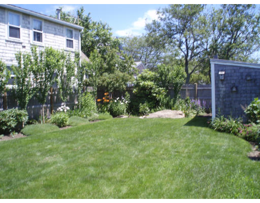 21 Reed Street Marshfield, MA 02020 - Photo 14 of 19 a view of a backyard with plants and large trees