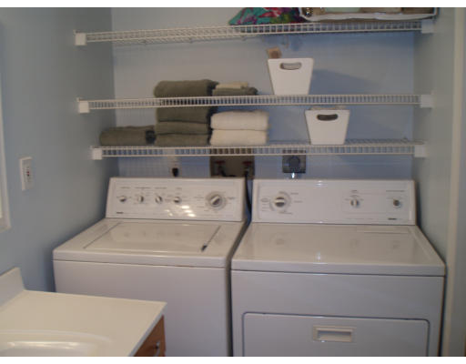 21 Reed Street Marshfield, MA 02020 - Photo 5 of 19 a utility room with dryer and washer
