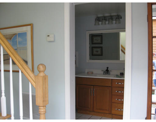 21 Reed Street Marshfield, MA 02020 - Photo 6 of 19 a bathroom with a sink a mirror and vanity