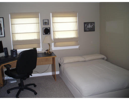 21 Reed Street Marshfield, MA 02020 - Photo 8 of 19 a bedroom with a bed and a window