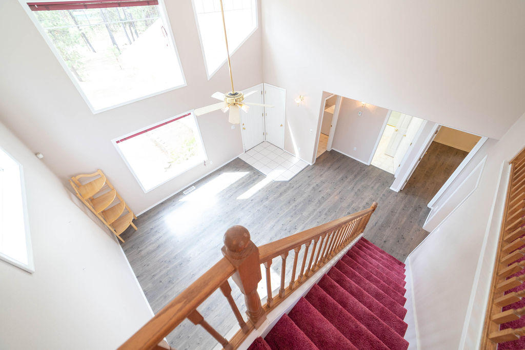 16944 Downey Road Bend, OR 97707 - Photo 25 of 44 a view of a living room with furniture and wooden floor