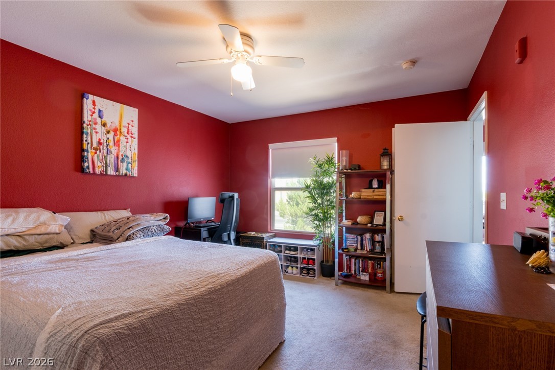 7255 West Sunset Road, Unit 2030 Las Vegas, NV 89113 - Photo 12 of 24 Bedroom with carpet floors and ceiling fan