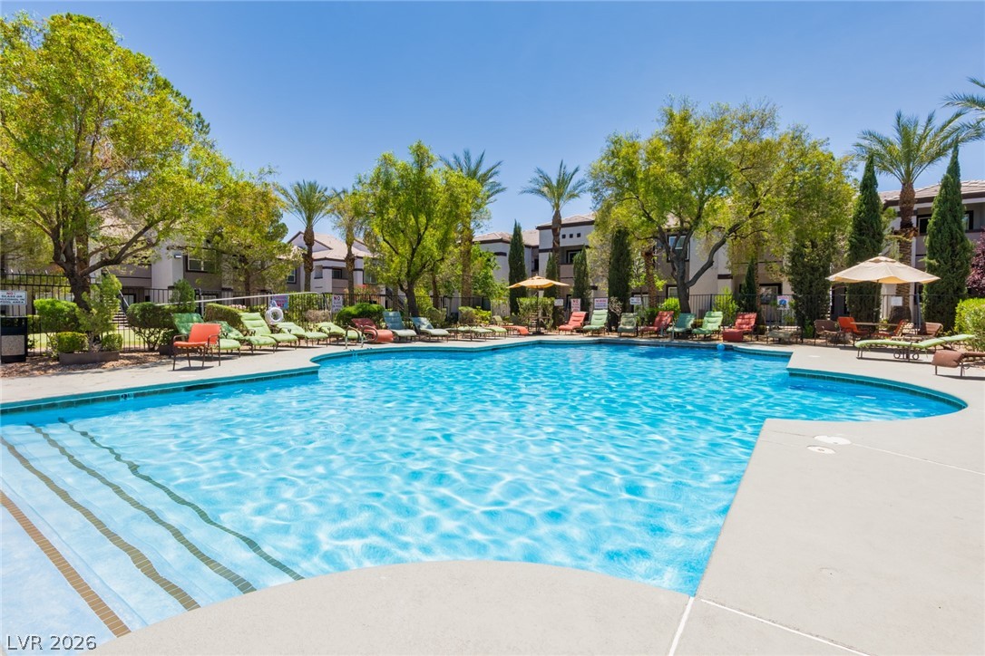7255 West Sunset Road, Unit 2030 Las Vegas, NV 89113 - Photo 22 of 24 Community pool with a patio
