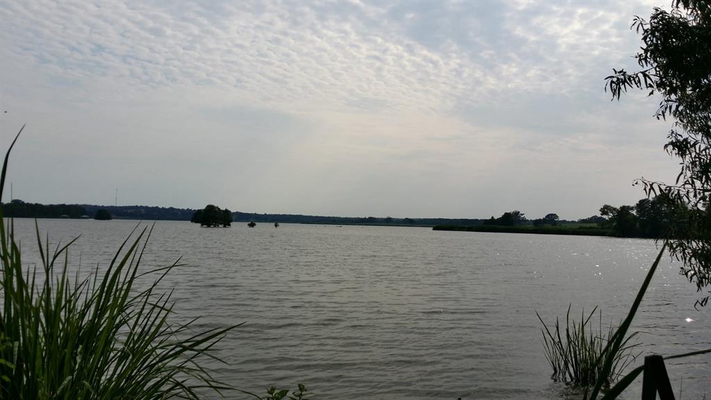 a view of outdoor space and lake