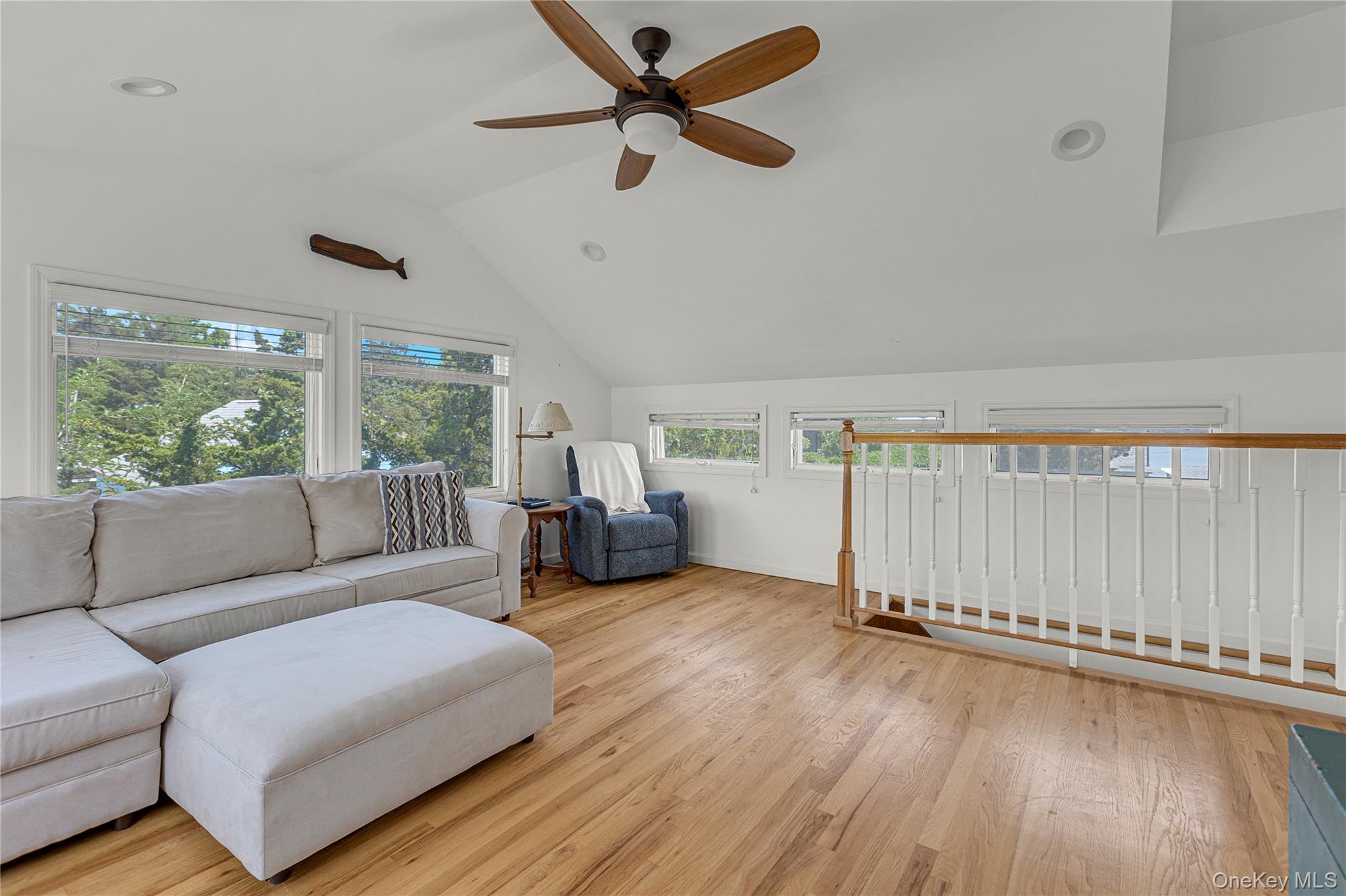 286 Towd Point Road Southampton, NY 11968 - Photo 12 of 35 a living room with furniture and a floor to ceiling window