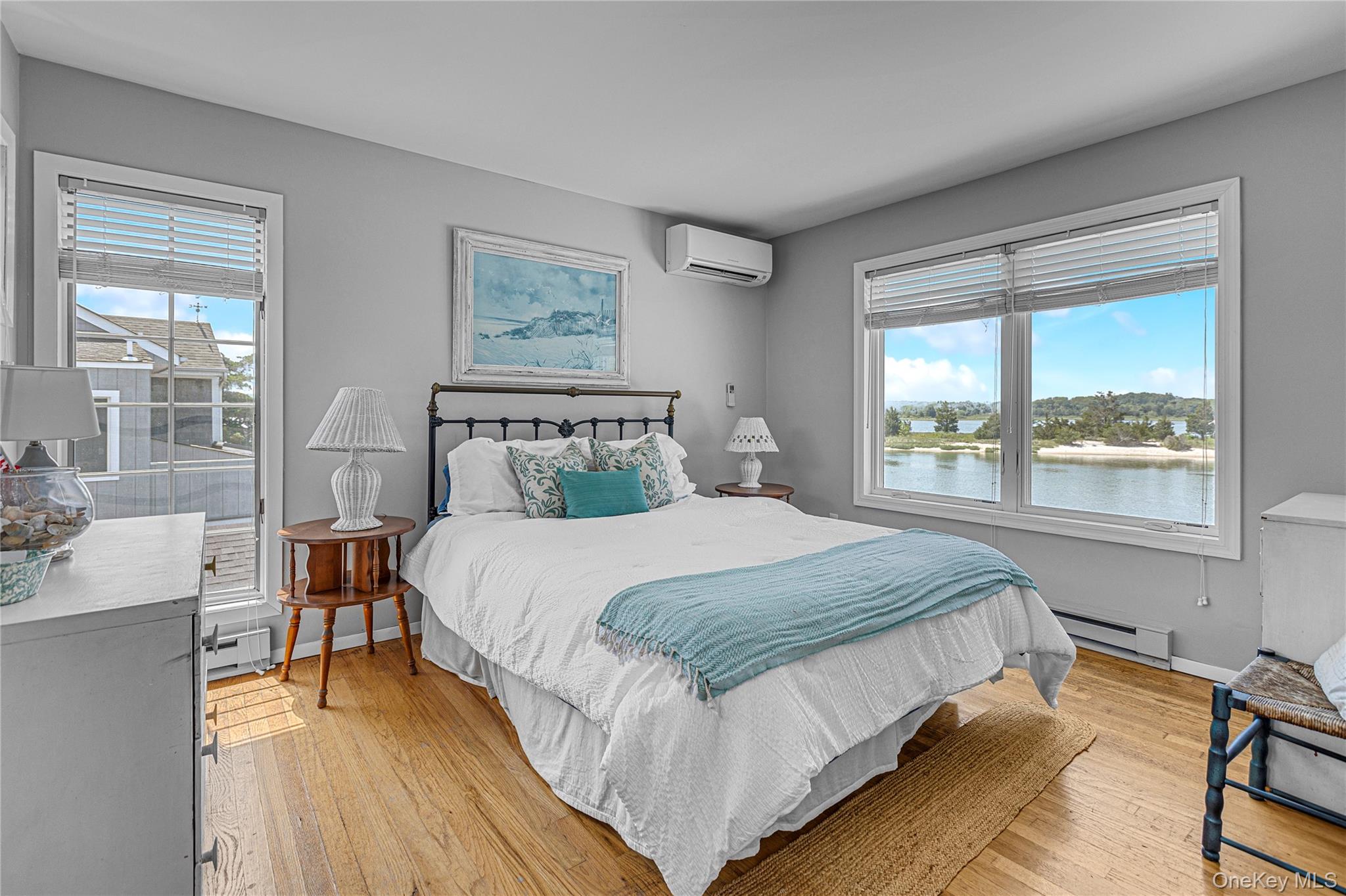 286 Towd Point Road Southampton, NY 11968 - Photo 16 of 35 a bedroom with a bed and window