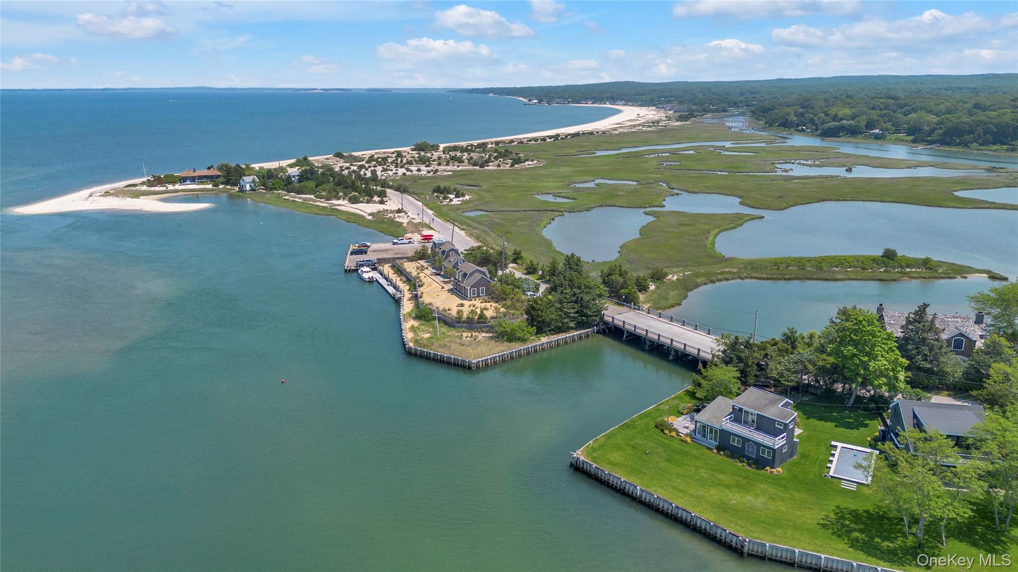 286 Towd Point Road Southampton, NY 11968 - Photo 31 of 35 an aerial view of ocean and residential houses with outdoor space