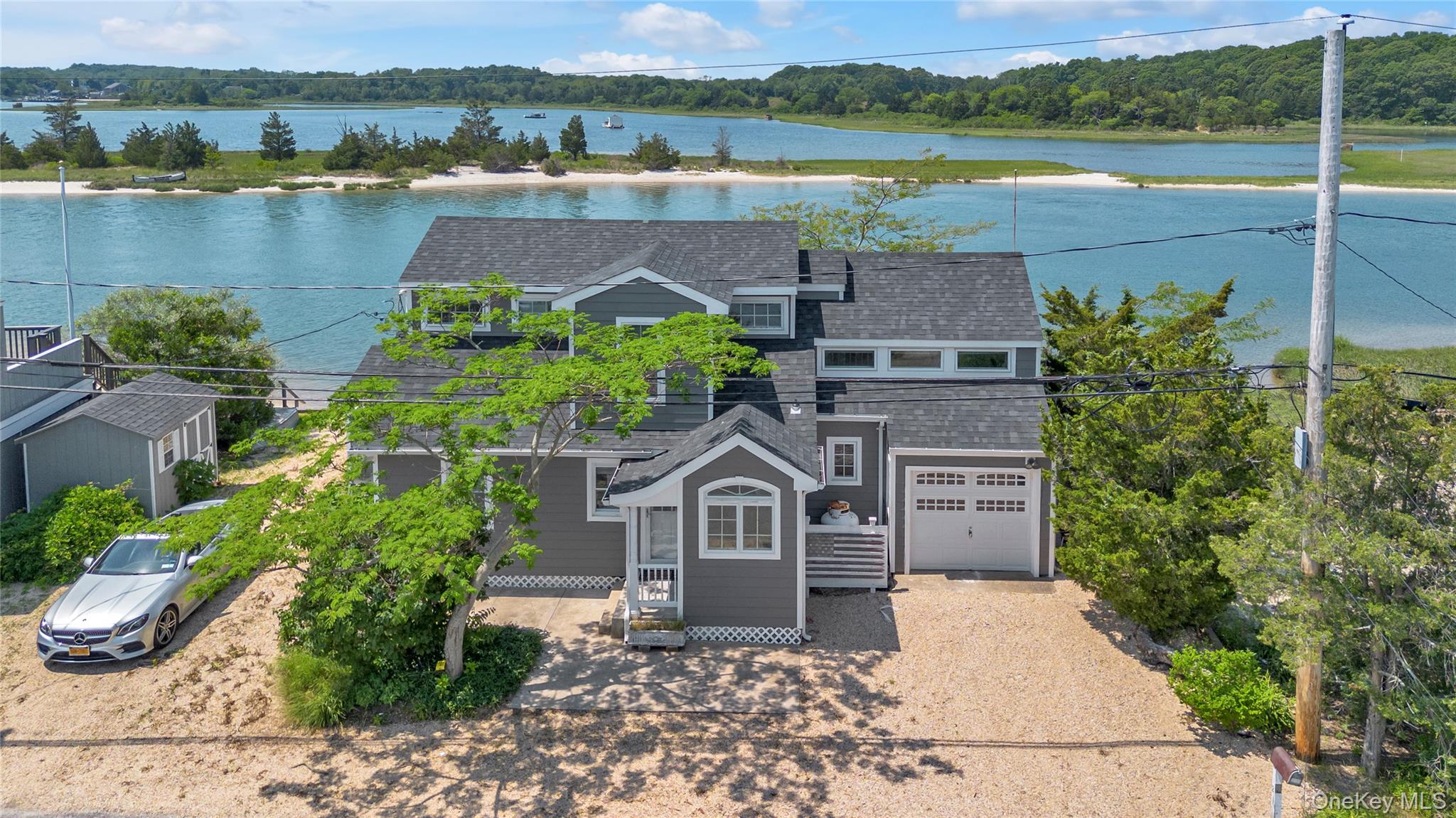 286 Towd Point Road Southampton, NY 11968 - Photo 34 of 35 an aerial view of a house with outdoor space and lake view