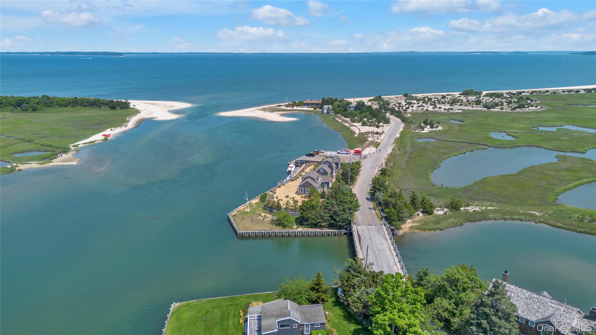 286 Towd Point Road Southampton, NY 11968 - Photo 8 of 35 an aerial view of a house with a yard