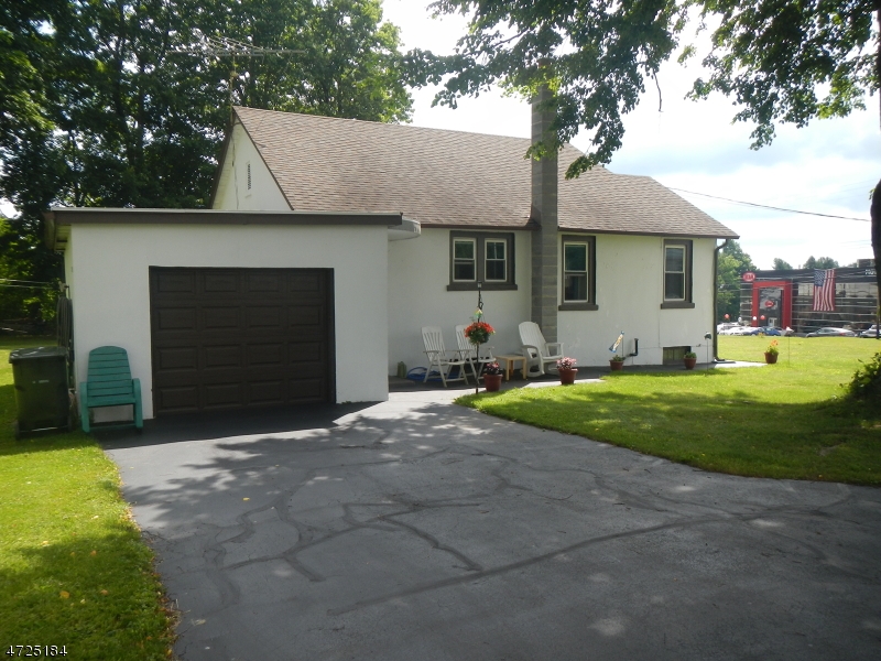 482 Highway 46 Hackettstown, NJ 07840 - Photo 13 of 16 a front view of house with yard and green space