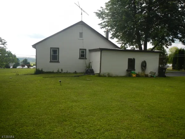 a house with garden in front of it