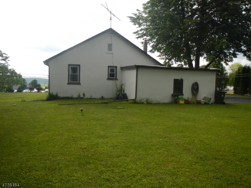 482 Highway 46 Hackettstown, NJ 07840 - Photo 16 of 16 a house with garden in front of it