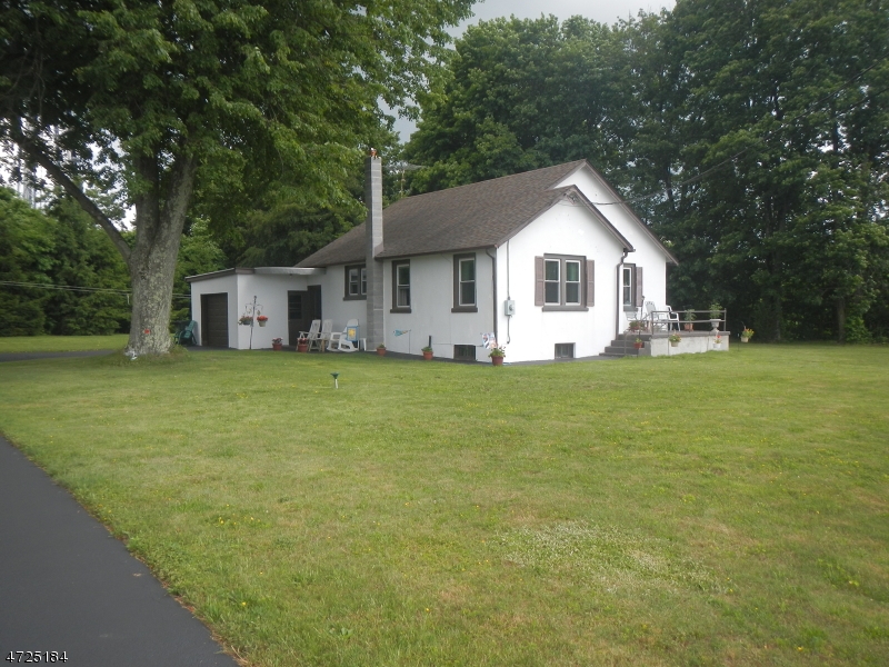 482 Highway 46 Hackettstown, NJ 07840 - Photo 3 of 16 a house with trees in the background