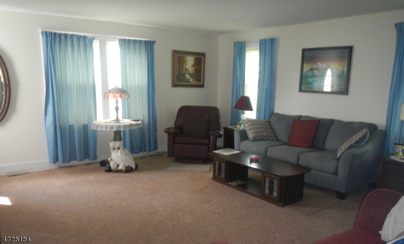 482 Highway 46 Hackettstown, NJ 07840 - Photo 6 of 16 a living room with furniture and a window