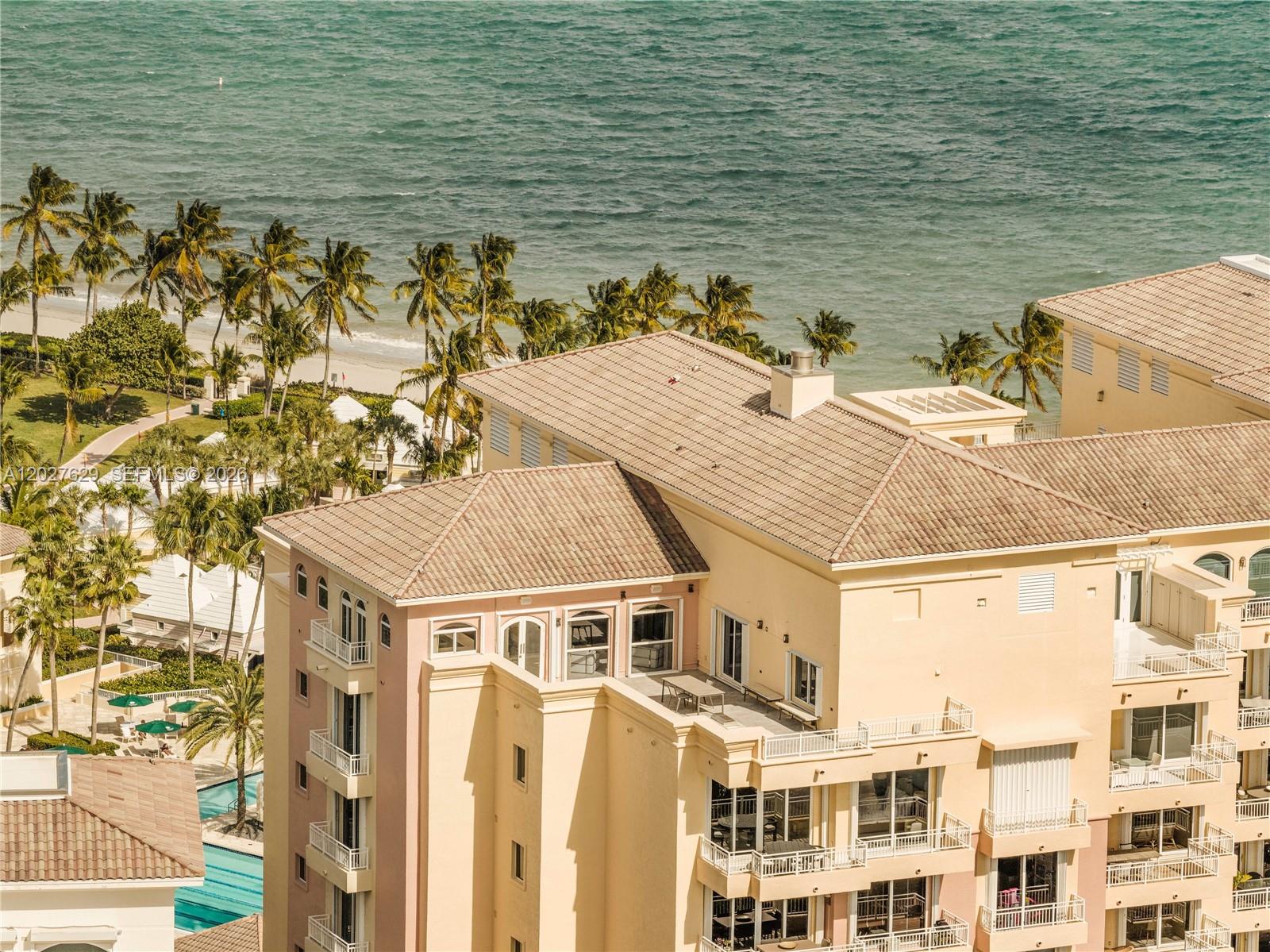 799 Crandon Boulevard, Unit PH8 Key Biscayne, FL 33149 - Photo 36 of 47 a aerial view of a house with a ocean view