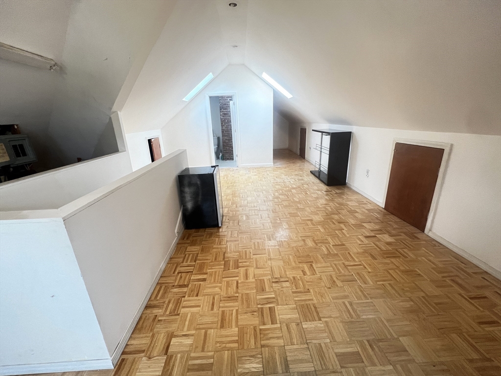 103 St Andrew Road, Unit 2 Boston, MA 02128 - Photo 14 of 20 a view of hallway with furniture and a rug
