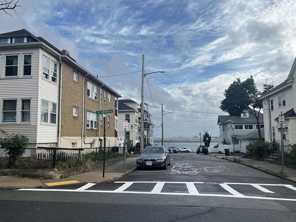 103 St Andrew Road, Unit 2 Boston, MA 02128 - Photo 19 of 20 a view of a city street from a house