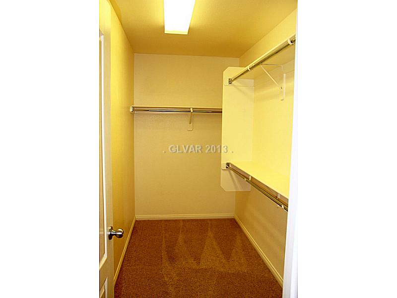 656 Doubleshot Lane Henderson, NV 89052 - Photo 31 of 35 Master Bath/Spa. his & her walk in closets