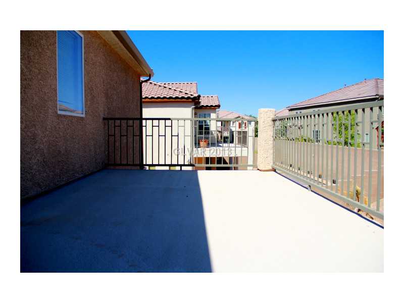 656 Doubleshot Lane Henderson, NV 89052 - Photo 32 of 35 Master Bedroom. Enormous Balcony from Master bedroom