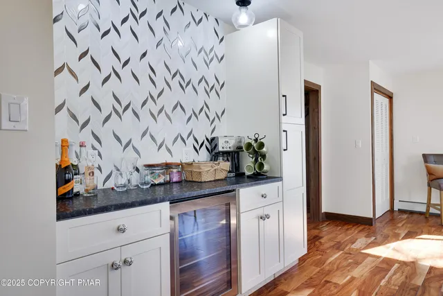 a view of a park with large trees