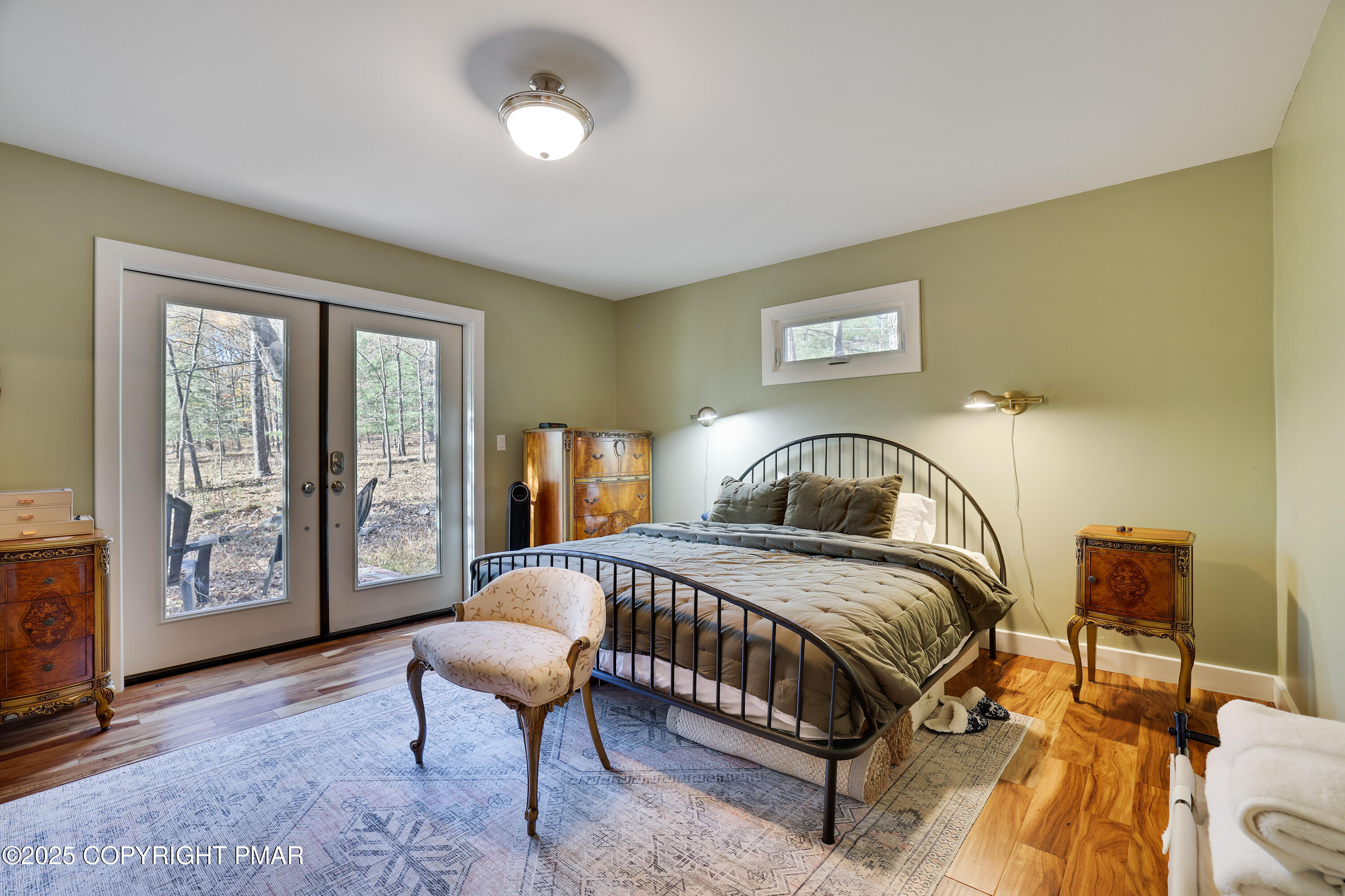 104 Haverhill Road Cresco, PA 18326 - Photo 30 of 86 a bedroom with a bed and wooden floor