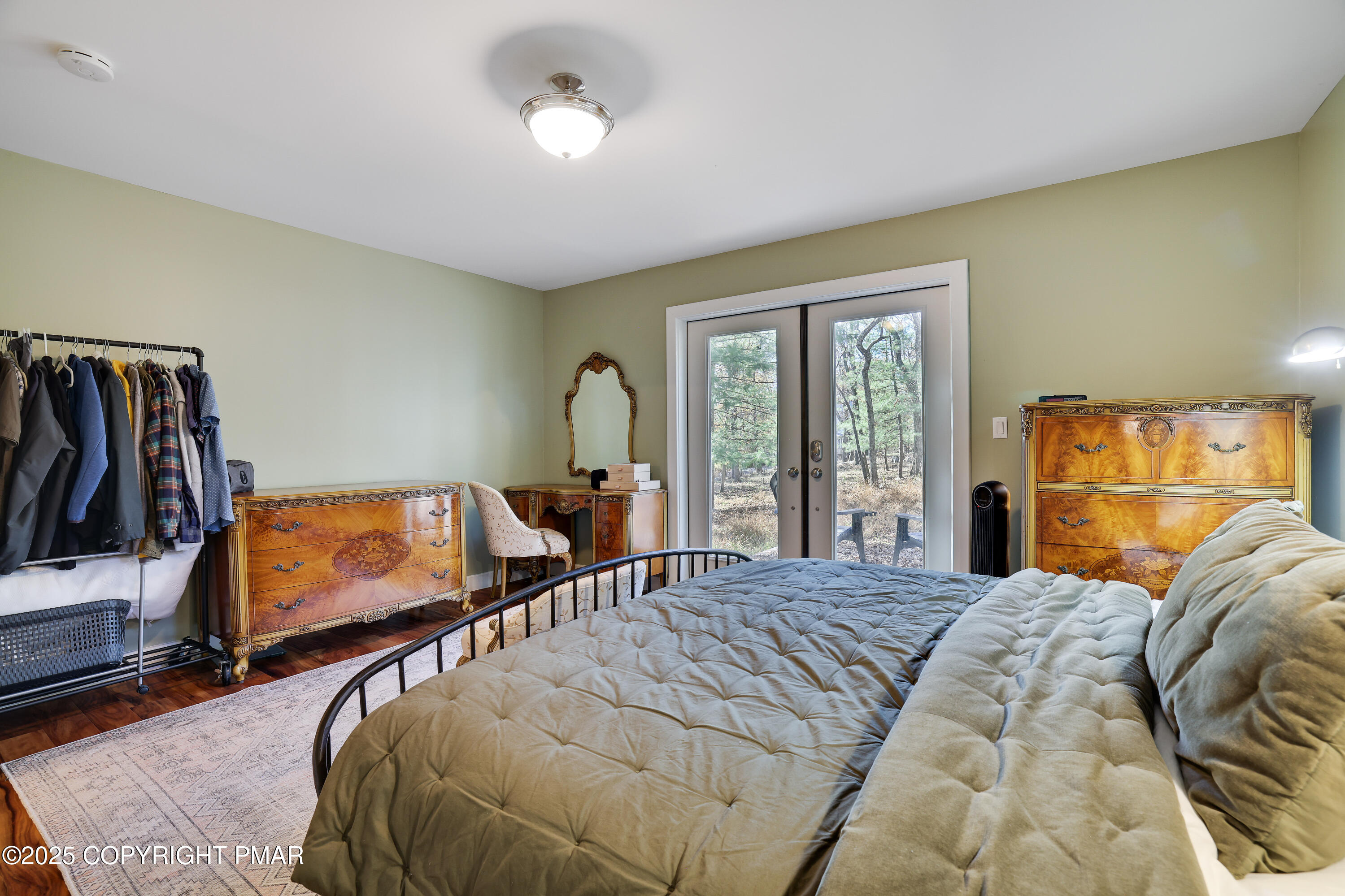 104 Haverhill Road Cresco, PA 18326 - Photo 31 of 86 a bedroom with a bed and wooden floor