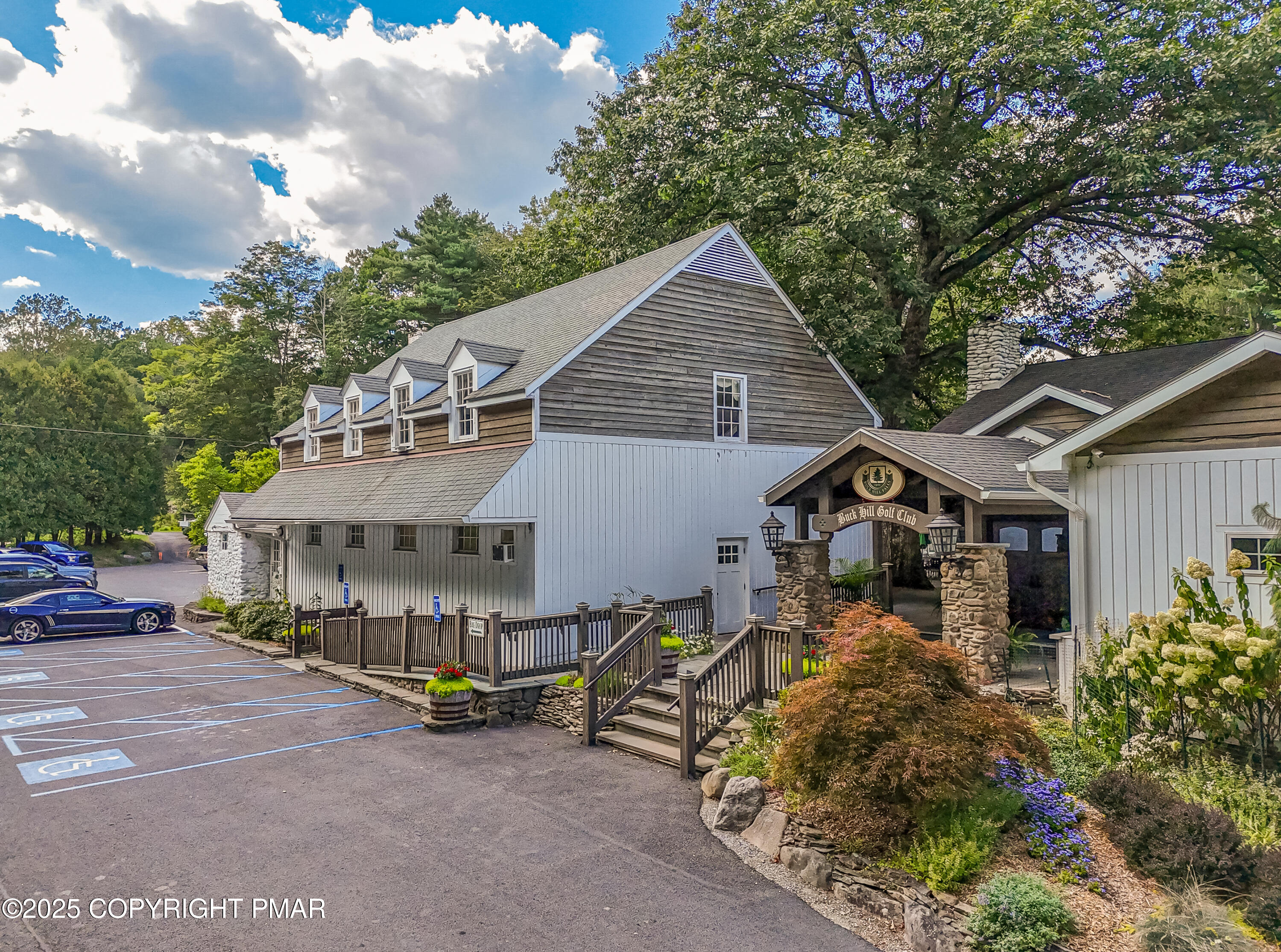 104 Haverhill Road Cresco, PA 18326 - Photo 76 of 86 a view of a house with a yard and sitting area
