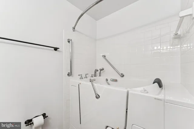 a bathroom with a sink and a shower