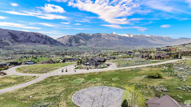 3722 Porcupine Ridge Drive, Unit 105 Eden, UT 84310 - Photo 11 of 22 View of mountain backdrop featuring nearby suburban area