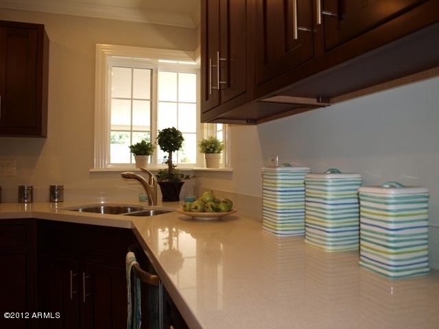 1837 East Roma Avenue Phoenix, AZ 85016 - Photo 9 of 32 Gleaming Quartz solid surface counters