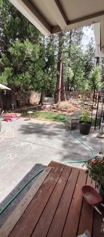 a view of a yard with an outdoor space