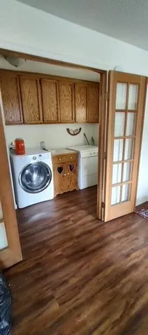 a bathroom with a sink and a window