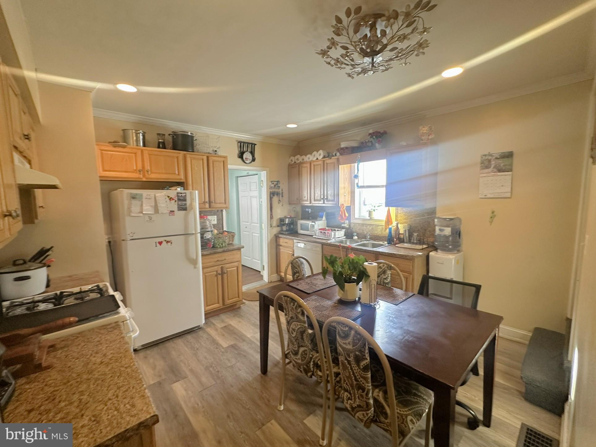 209 Fulton Street Hanover, PA 17331 - Photo 13 of 32 a view of a dining room with furniture and wooden floor