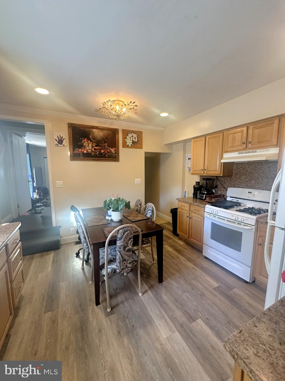 209 Fulton Street Hanover, PA 17331 - Photo 15 of 32 a view of a dining room with furniture and wooden floor