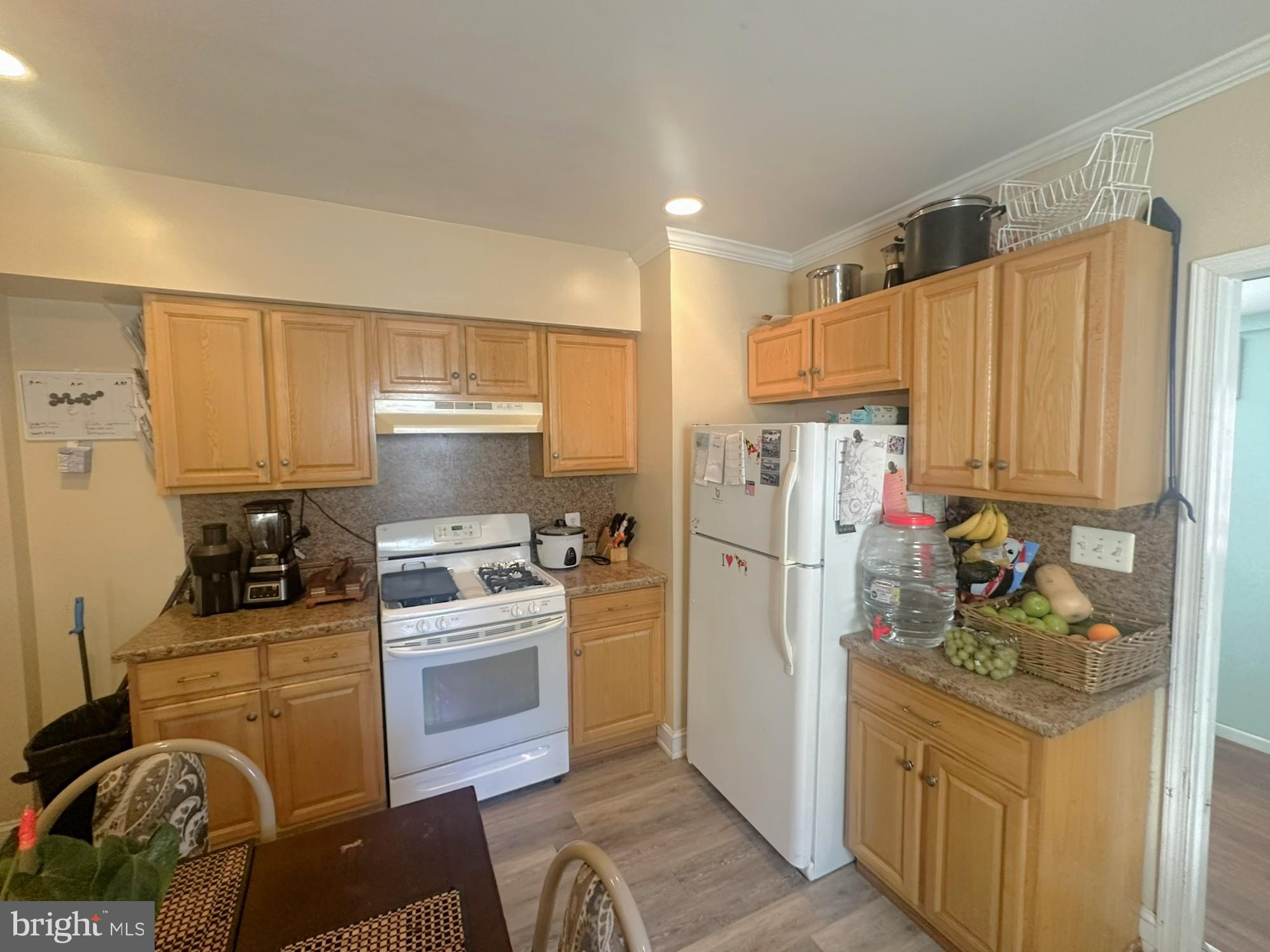 209 Fulton Street Hanover, PA 17331 - Photo 16 of 32 a kitchen with a refrigerator stove and sink