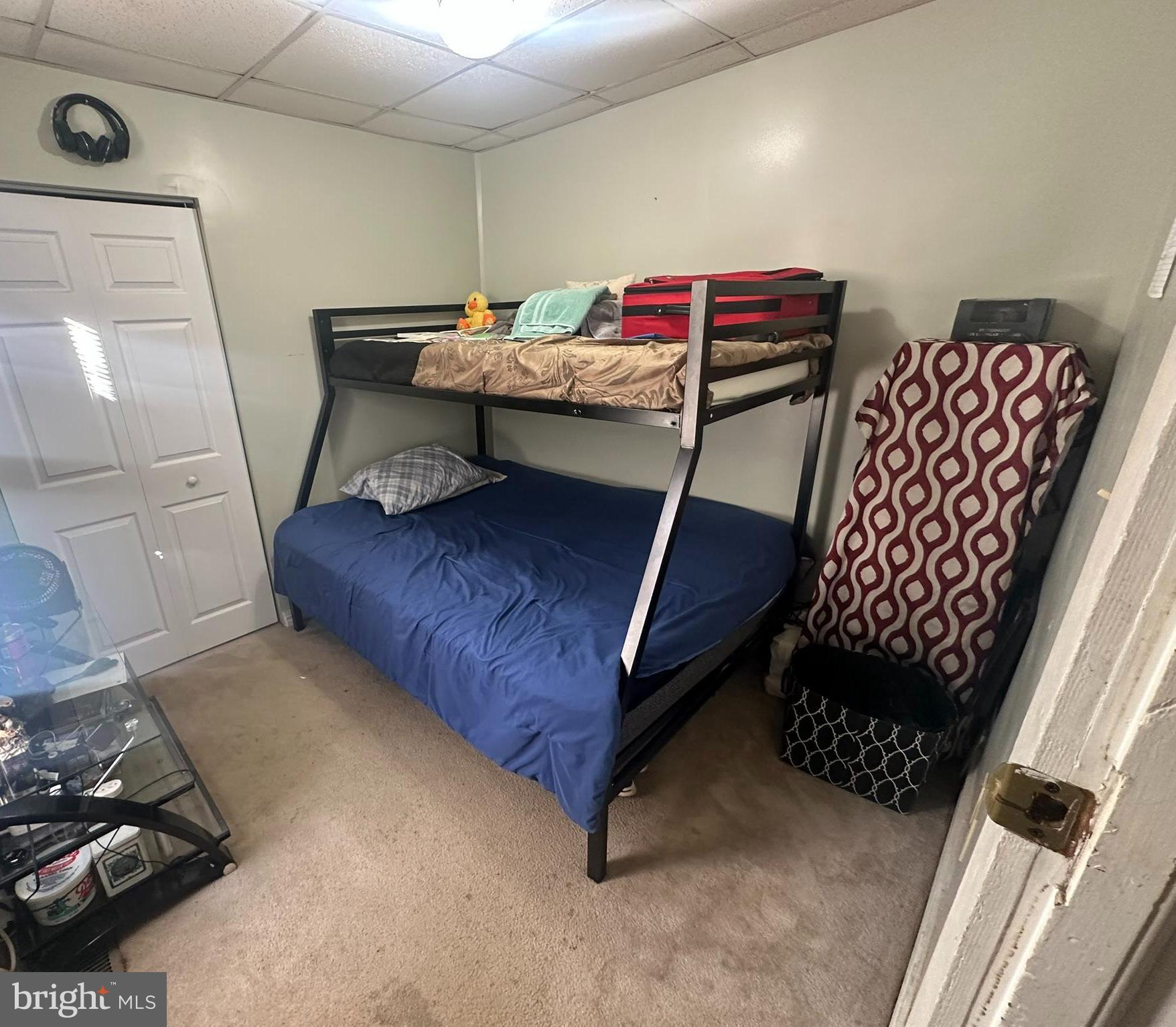 209 Fulton Street Hanover, PA 17331 - Photo 20 of 32 a bedroom with a bed and a dresser