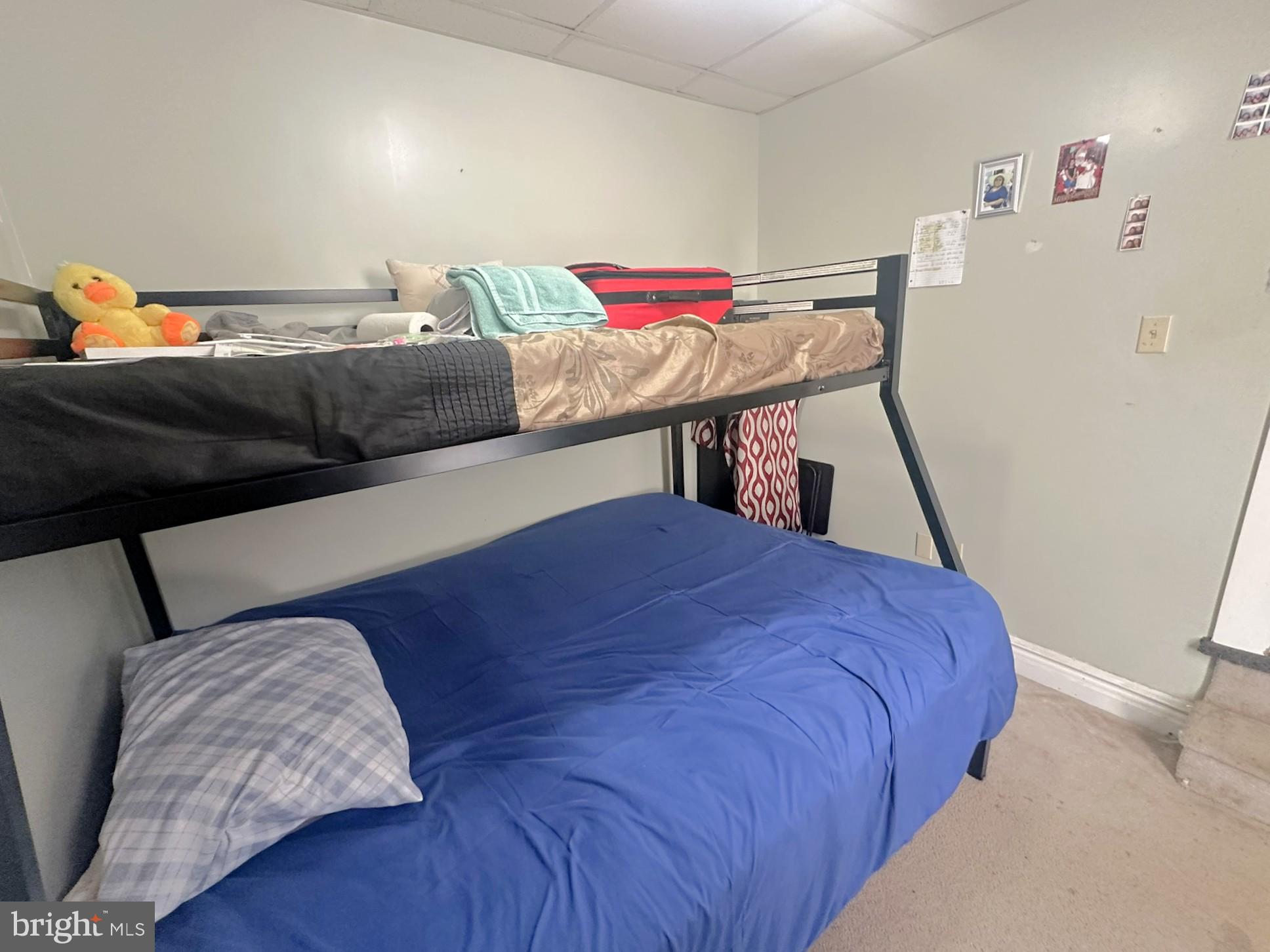 209 Fulton Street Hanover, PA 17331 - Photo 21 of 32 a bedroom with a bed and a dresser
