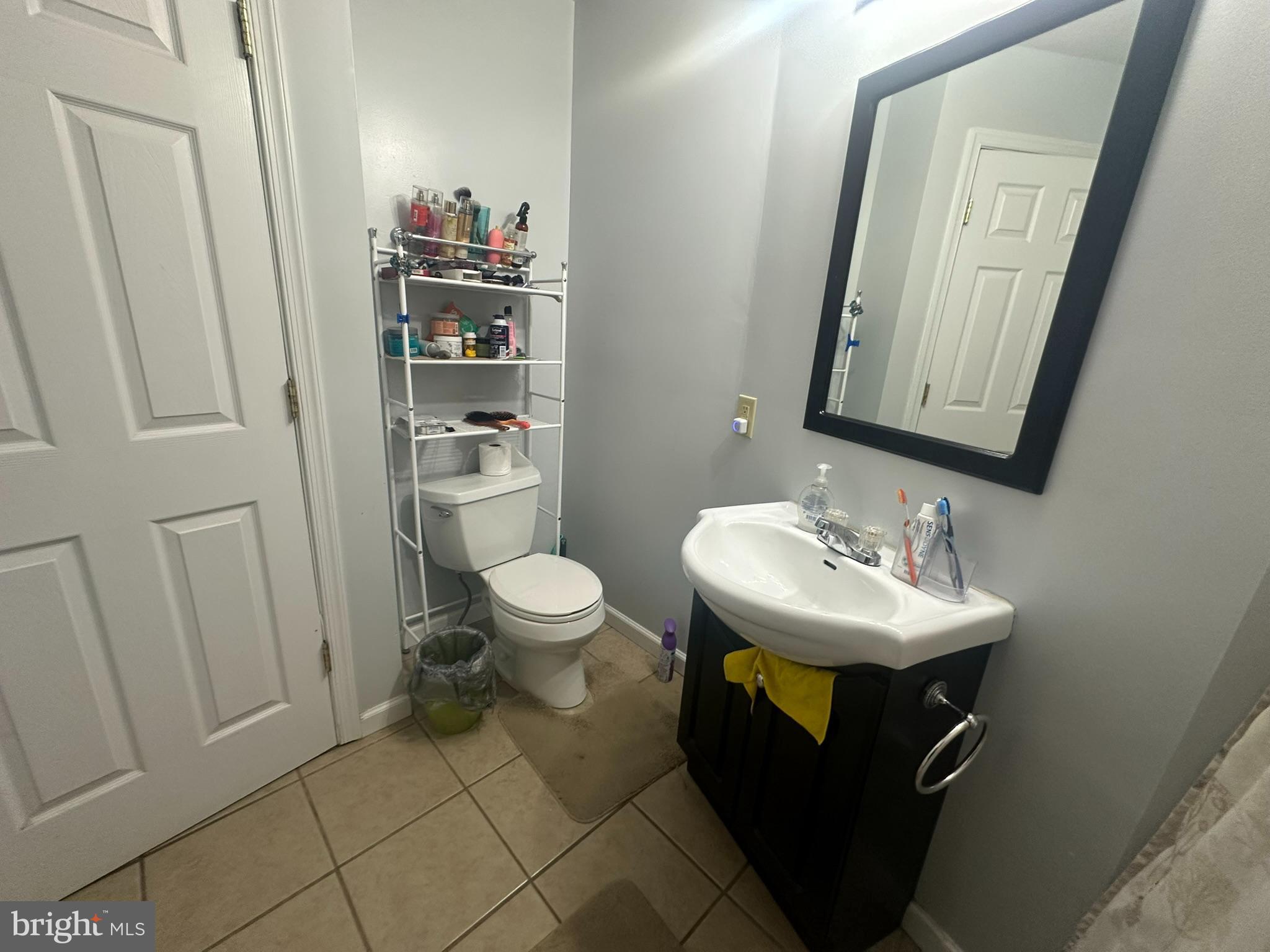 209 Fulton Street Hanover, PA 17331 - Photo 27 of 32 a bathroom with a sink toilet and mirror