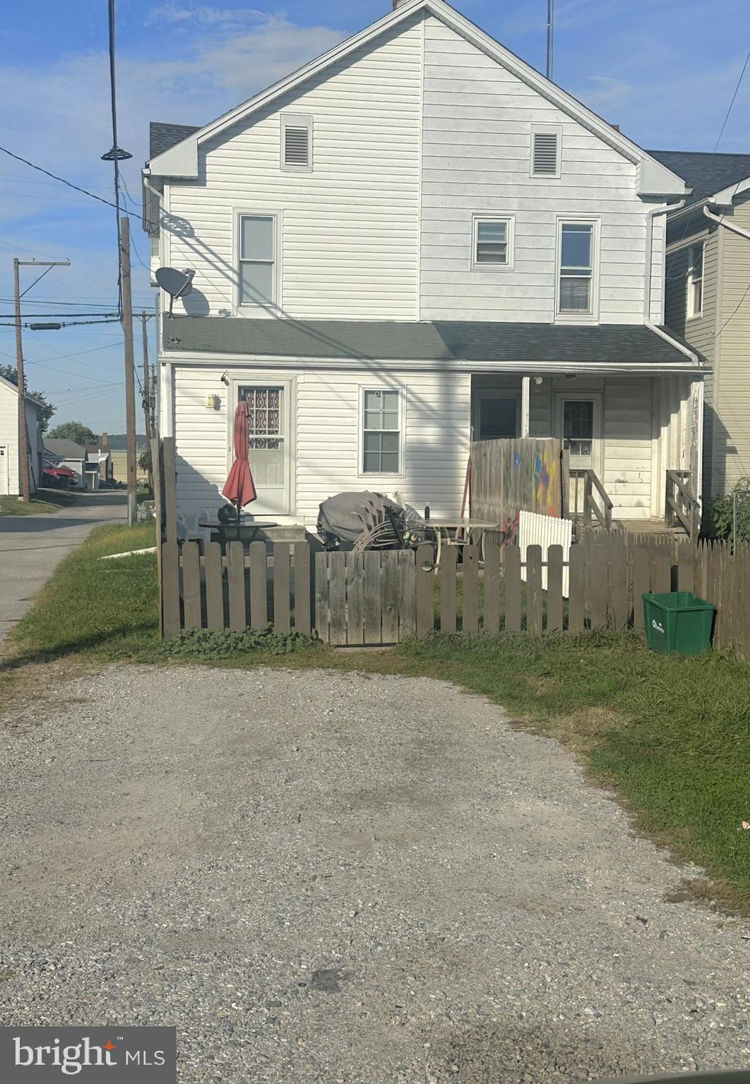 209 Fulton Street Hanover, PA 17331 - Photo 6 of 32 a front view of a house with garden