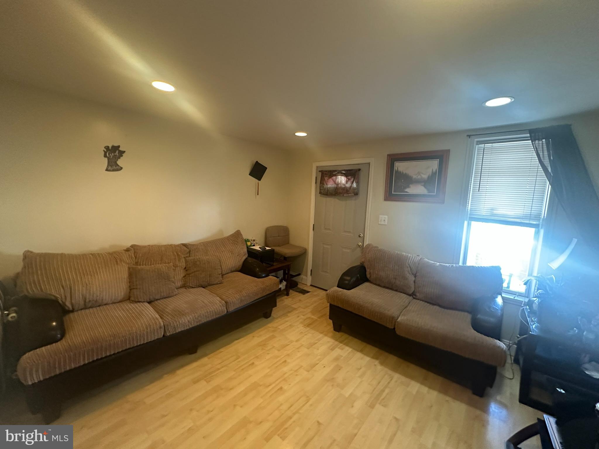 209 Fulton Street Hanover, PA 17331 - Photo 10 of 32 a living room with furniture and a couch