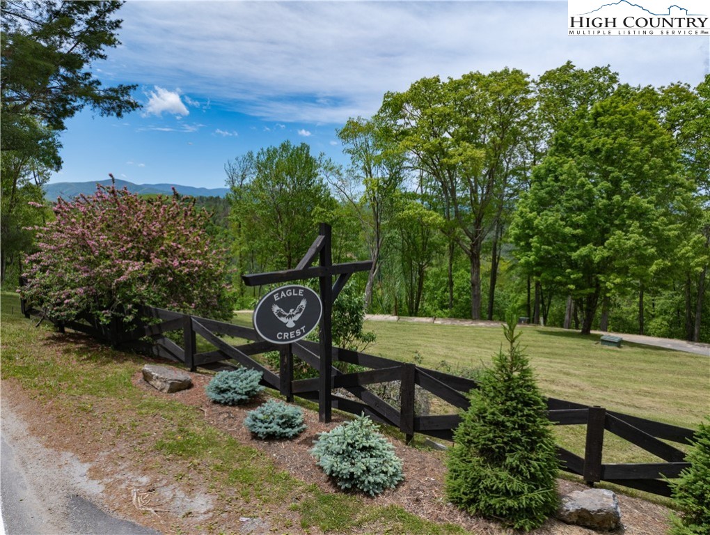 Ec1 Ec1 Eagle Crest Trail Elk Park, NC 28622 - Photo 14 of 15 a backyard of a house with lots of green space