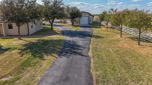 a living room with furniture and flat screen tv