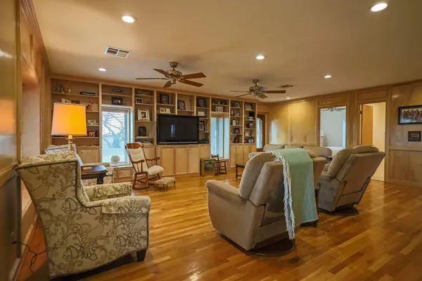 a kitchen with cabinets appliances and a sink