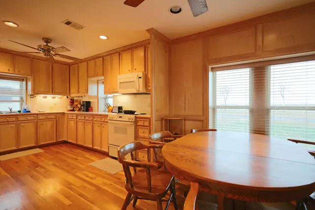 a bedroom with a large bed and a tv