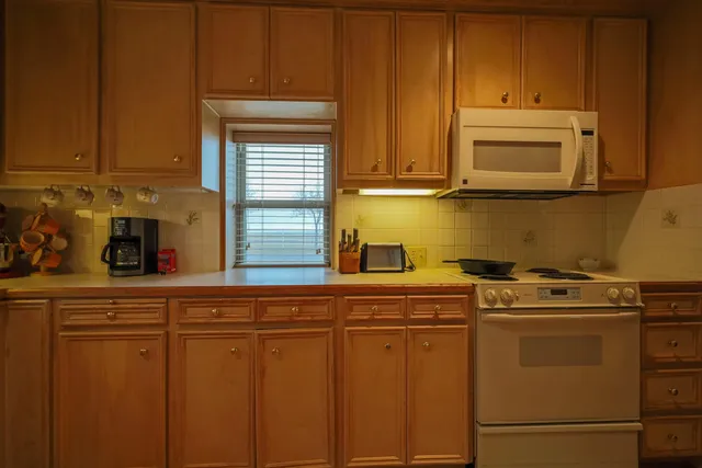 a view of a bathroom from the hallway