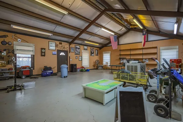 a view of a lake with a yard