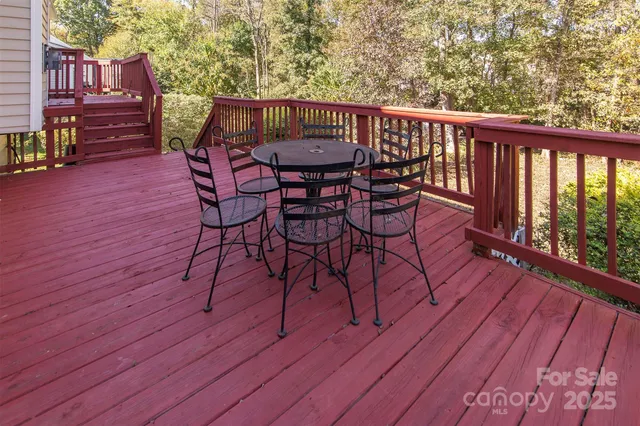 a view of a chairs on the roof deck